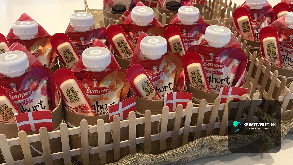 Farm-themed 1st birthday treats laid out for a nursery celebration