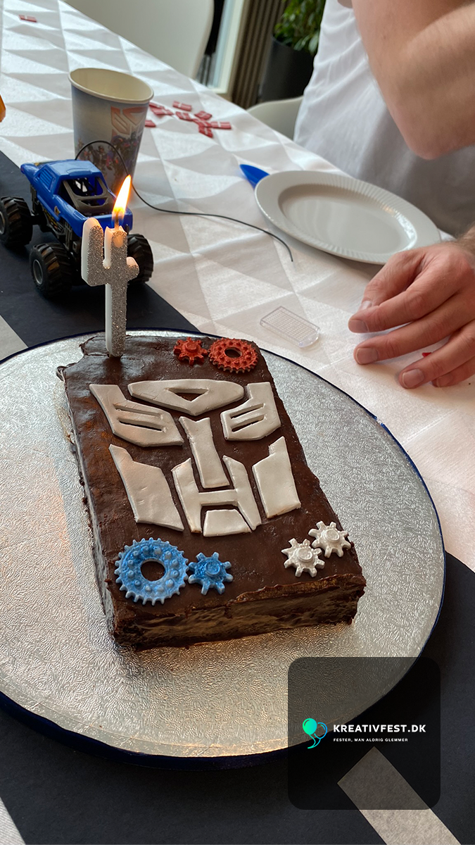 Transformers-themed birthday cake with sugar gears