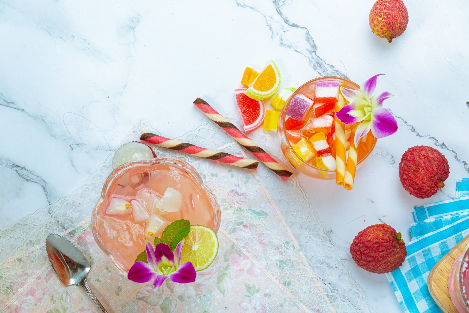 Colorful kids' cocktail drinks garnished with fruit