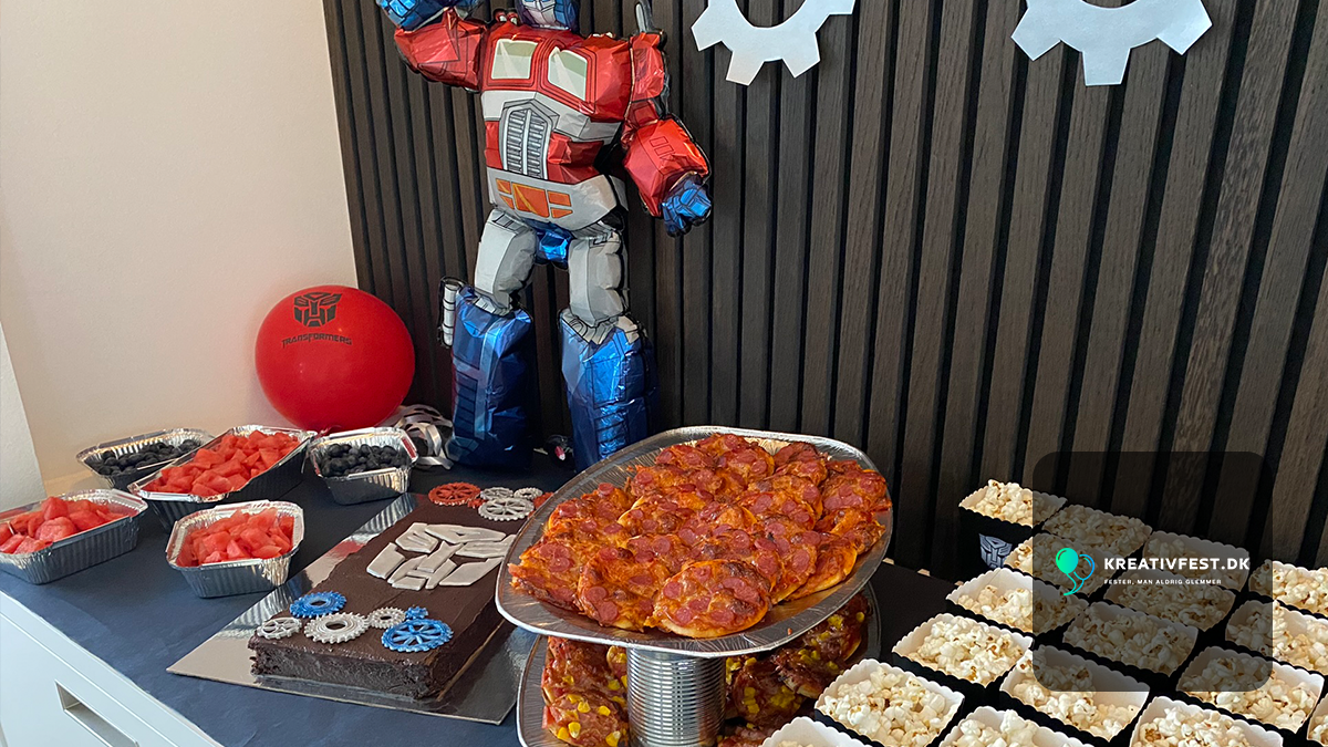Transformers party food spread on silver trays