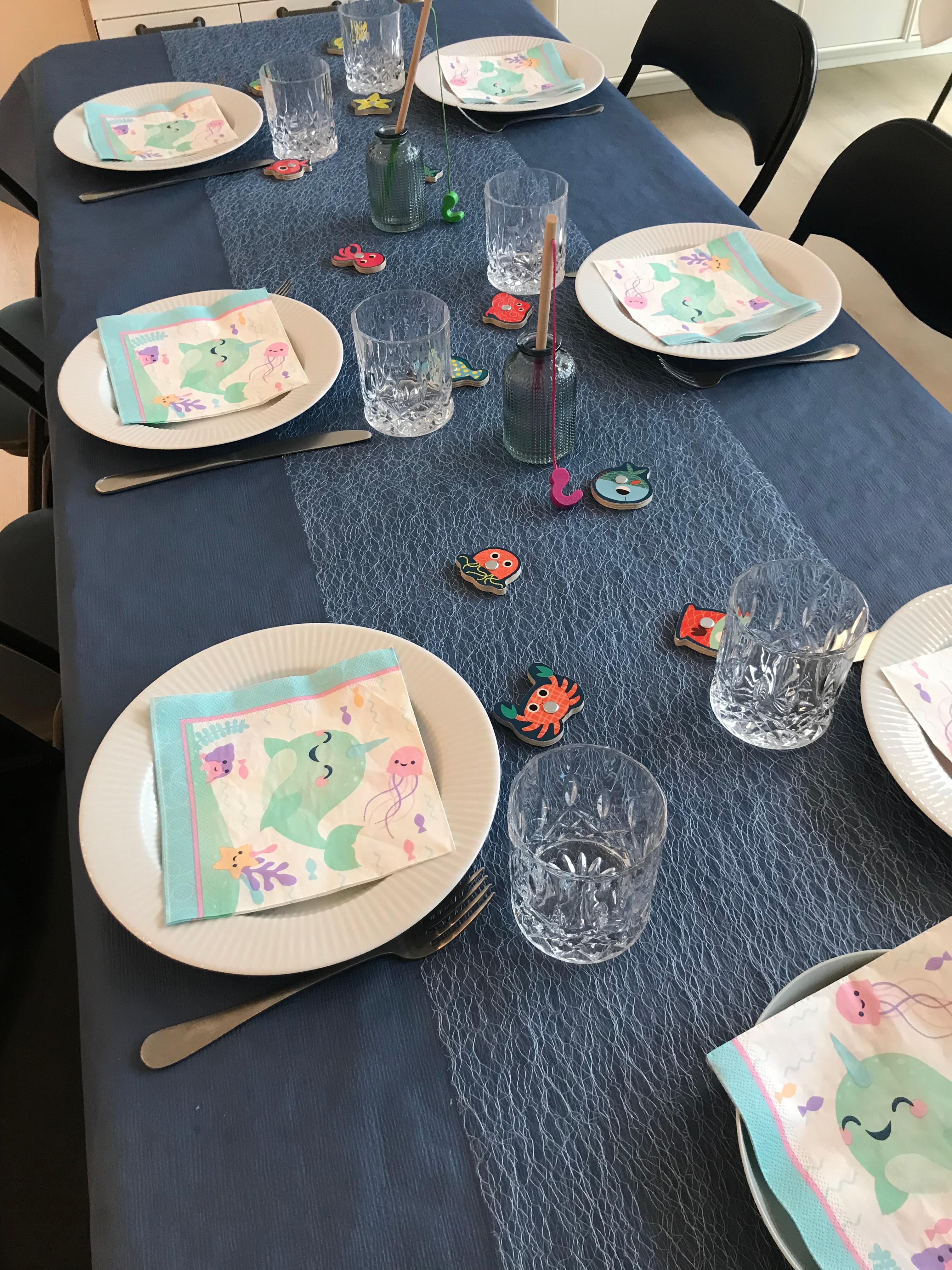 Hand puppets and a toy submarine used as party decor